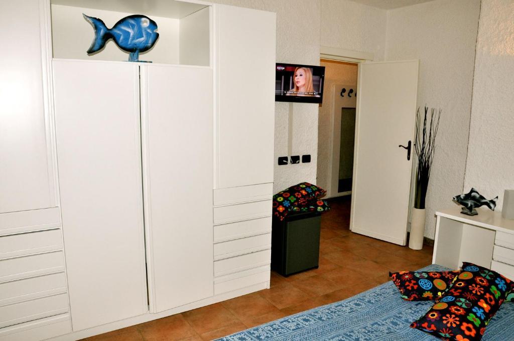 Club Esse Cala Bitta Hotel Baja Sardinia Szoba fotó